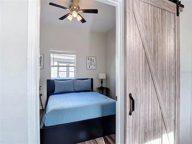 a view of a livingroom with furniture and wooden floor