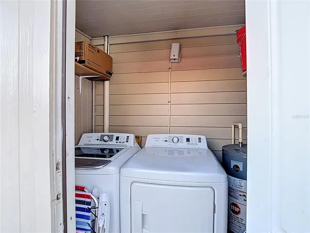 a view of a balcony with furniture
