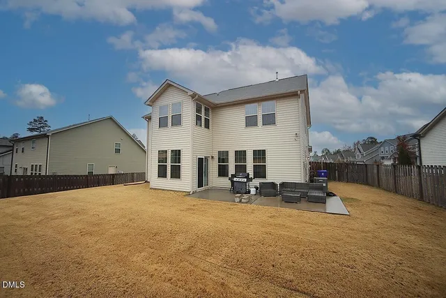 a view of a house with a patio