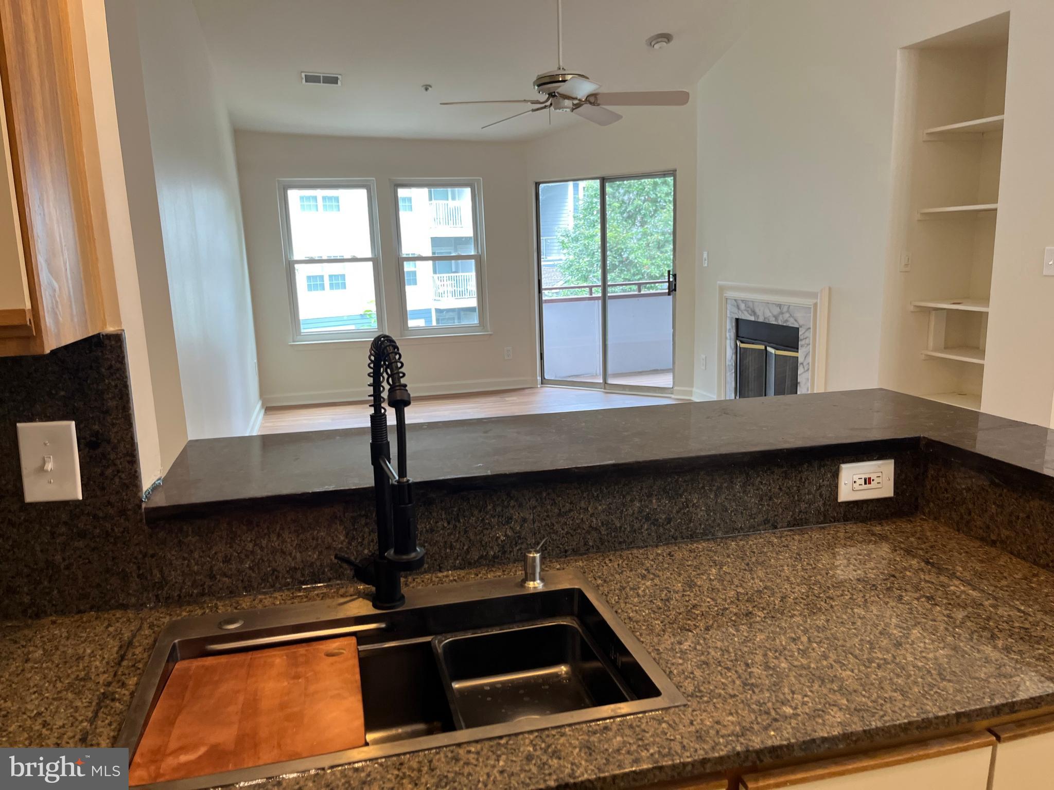 3301 Sir Thomas Drive, Unit 6B41 Silver Spring, MD 20904 - Photo 19 of 54 a kitchen with a sink and a window
