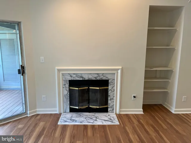 a bath tub sitting next to a white toilet and sink