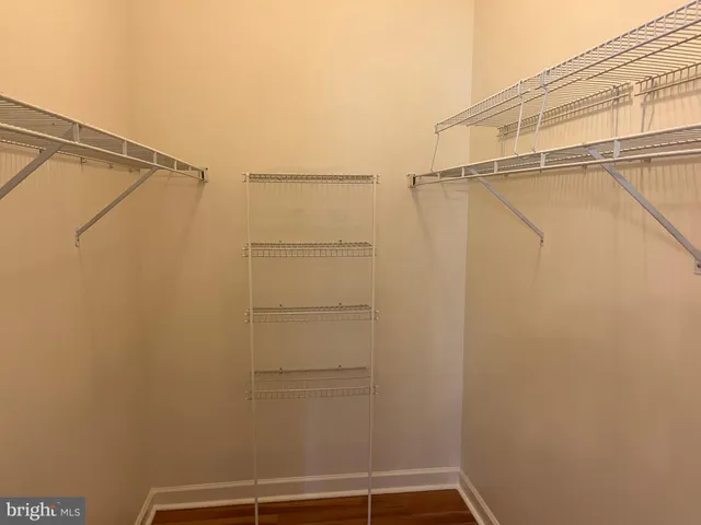 a bathroom with a toilet and a bath tub