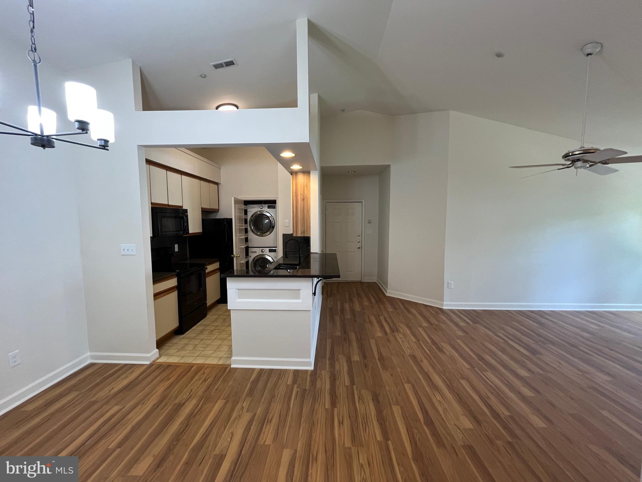 3301 Sir Thomas Drive, Unit 6B41 Silver Spring, MD 20904 - Photo 45 of 54 a view of empty room with wooden floor