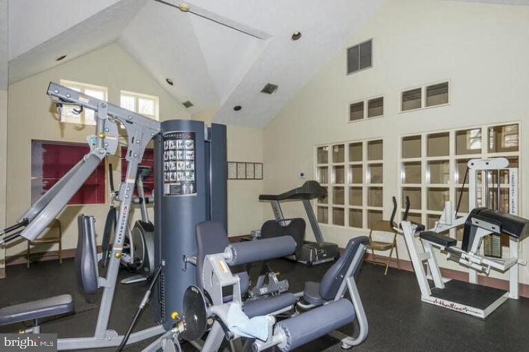 3301 Sir Thomas Drive, Unit 6B41 Silver Spring, MD 20904 - Photo 53 of 54 a work room with furniture and gym equipment
