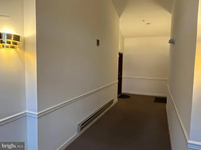 a bathroom with a sink a mirror and shower