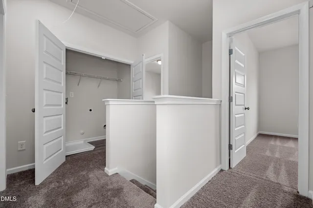 a view of a storage & utility room with cabinets