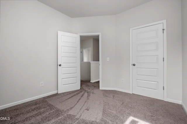 wooden floor & closet in a room