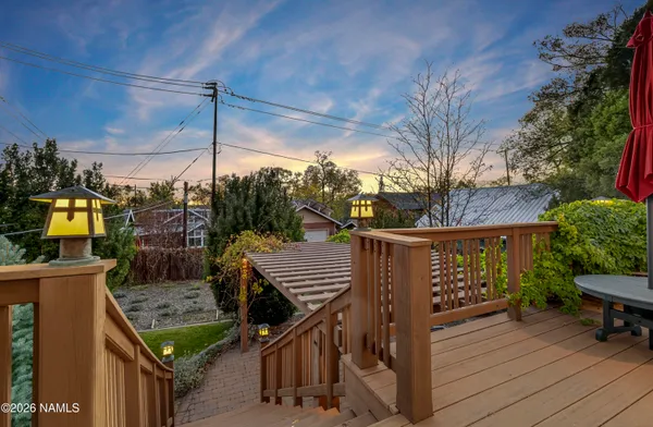 a view of a wooden roof deck