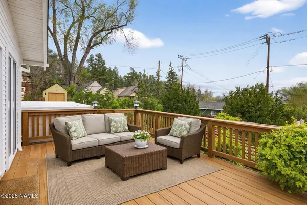a view of a house with a yard and plants