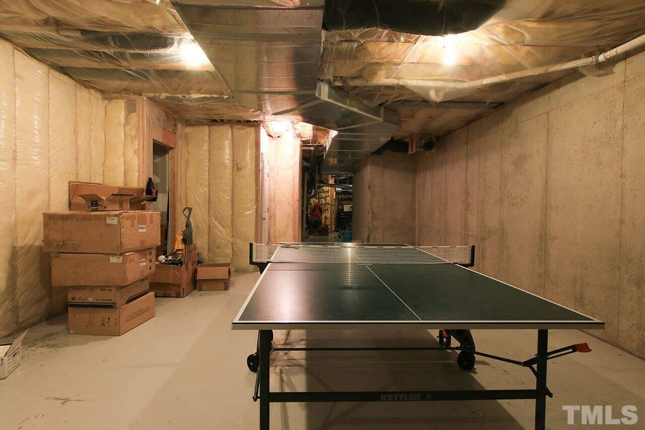 1509 Liatris Lane Raleigh, NC 27613 - Photo 22 of 27 a room with gym equipment