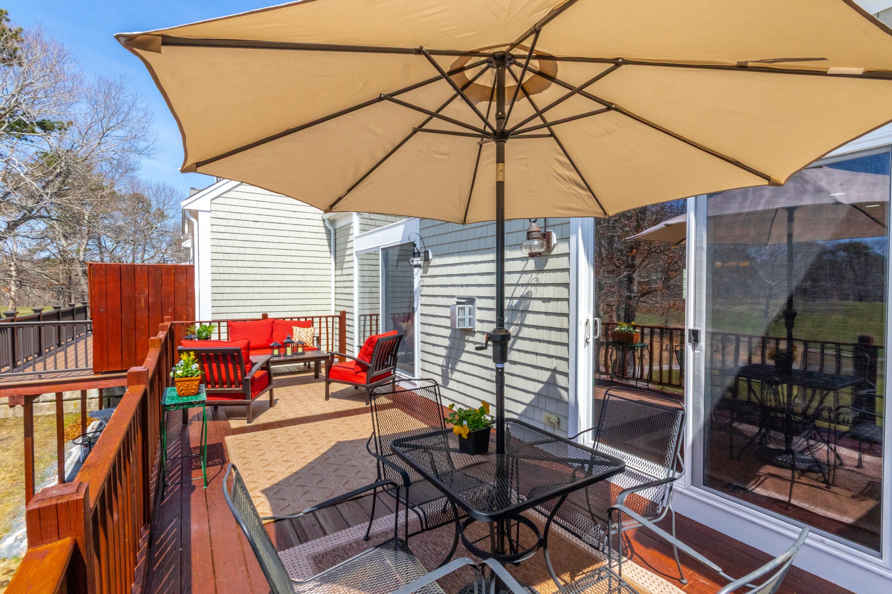 36 Turnberry Road, Unit 36 Buzzards Bay, MA 02532 - Photo 33 of 41 Back deck access from 2 sliders