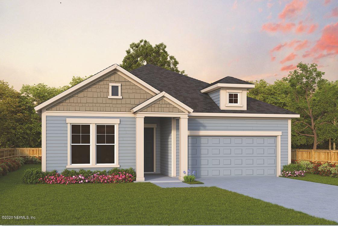 300 Shadow Rdg Trail Ponte Vedra, FL 32081 - Photo 1 of 1 a front view of a house with a garden