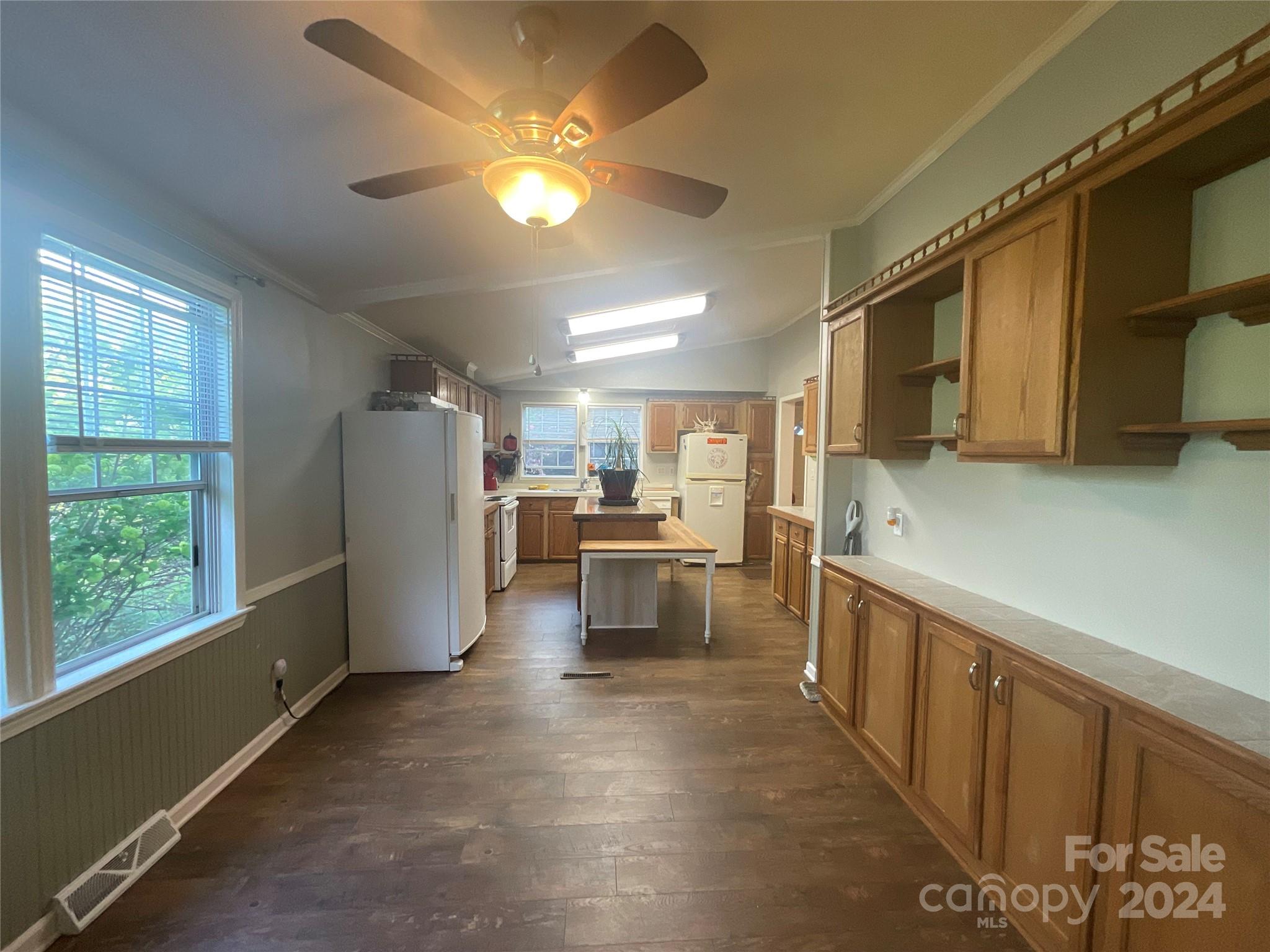 900 Jim Elliott Road Shelby, NC 28150 - Photo 12 of 29 a kitchen with refrigerator and cabinets