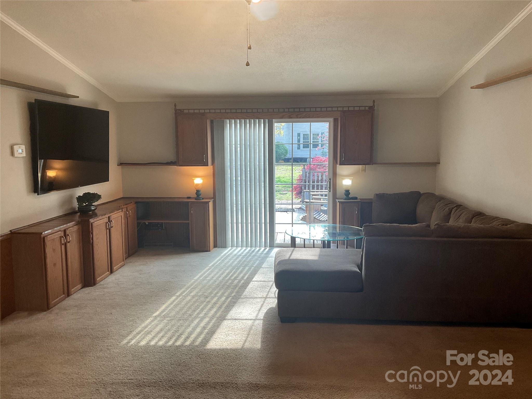 900 Jim Elliott Road Shelby, NC 28150 - Photo 15 of 29 a living room with furniture and a flat screen tv
