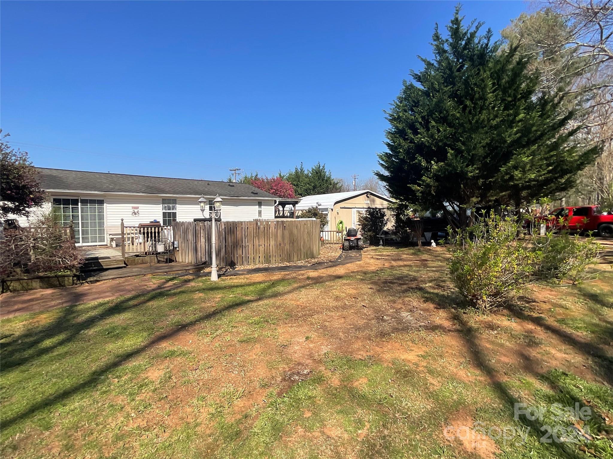 900 Jim Elliott Road Shelby, NC 28150 - Photo 2 of 29 a view of residential houses with yard and road