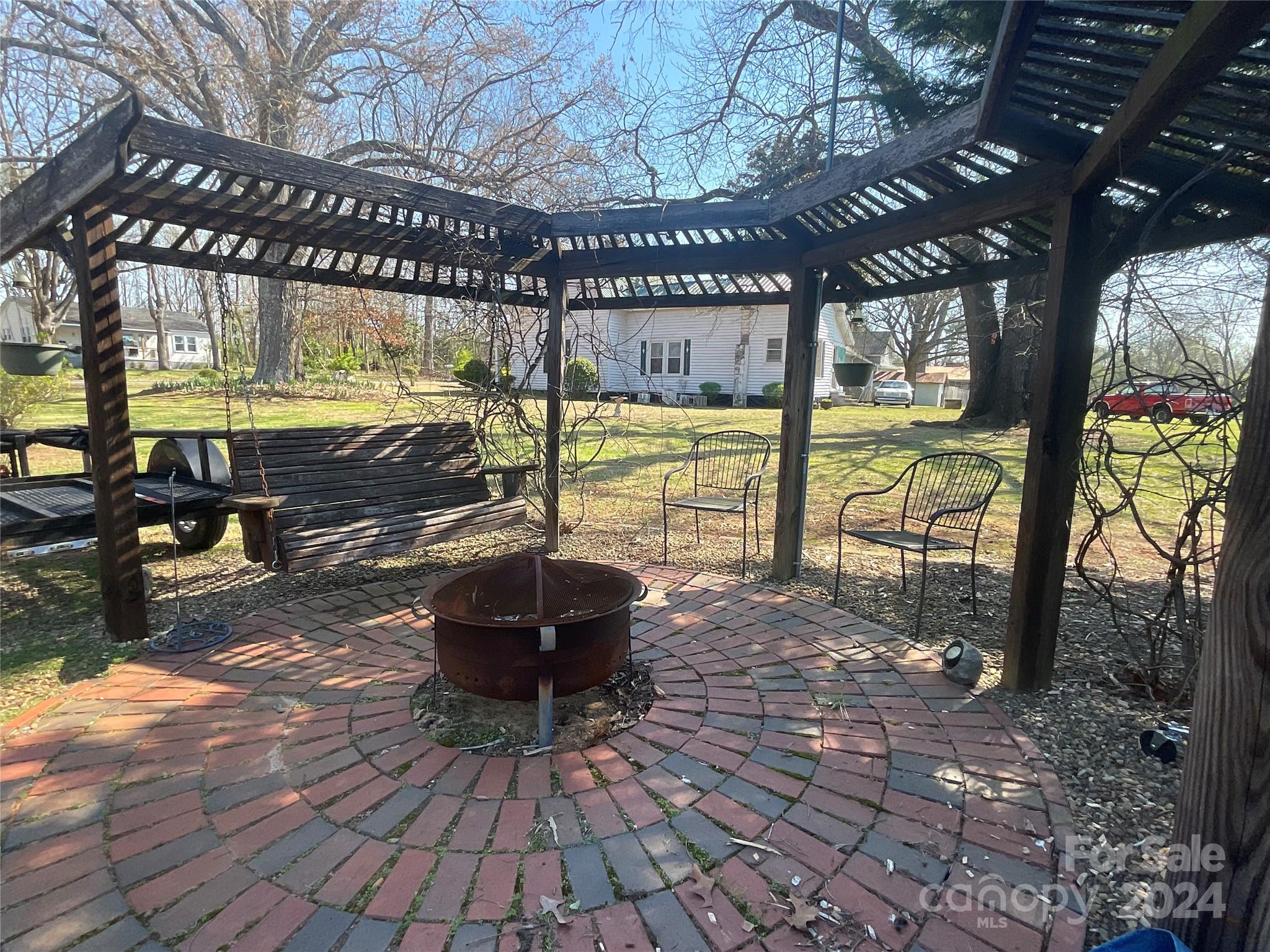 900 Jim Elliott Road Shelby, NC 28150 - Photo 5 of 29 a view of swimming pool with seating space