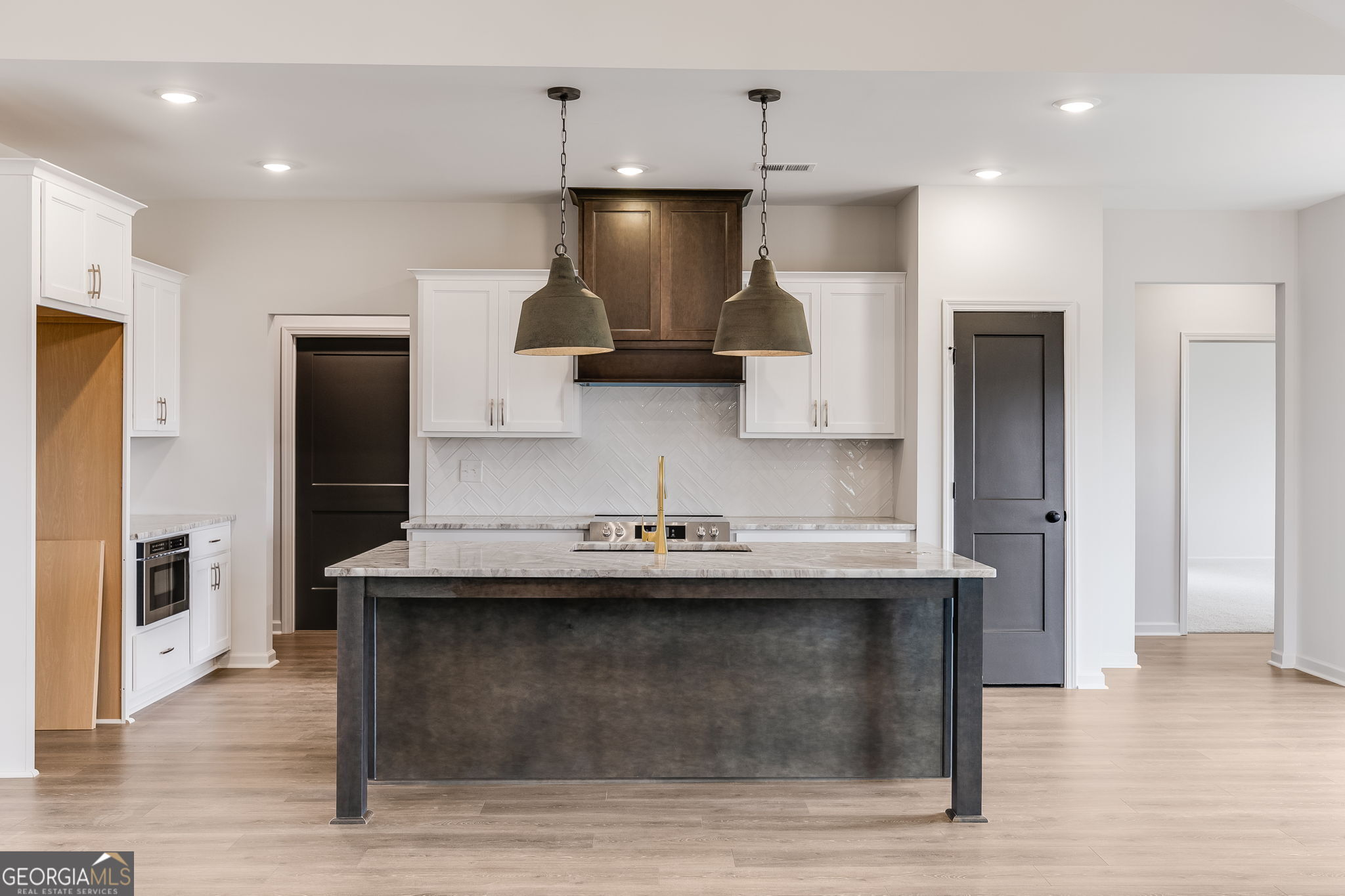 12 Stewart Road Roopville, GA 30170 - Photo 12 of 48 a kitchen with stainless steel appliances granite countertop a sink a stove and a refrigerator