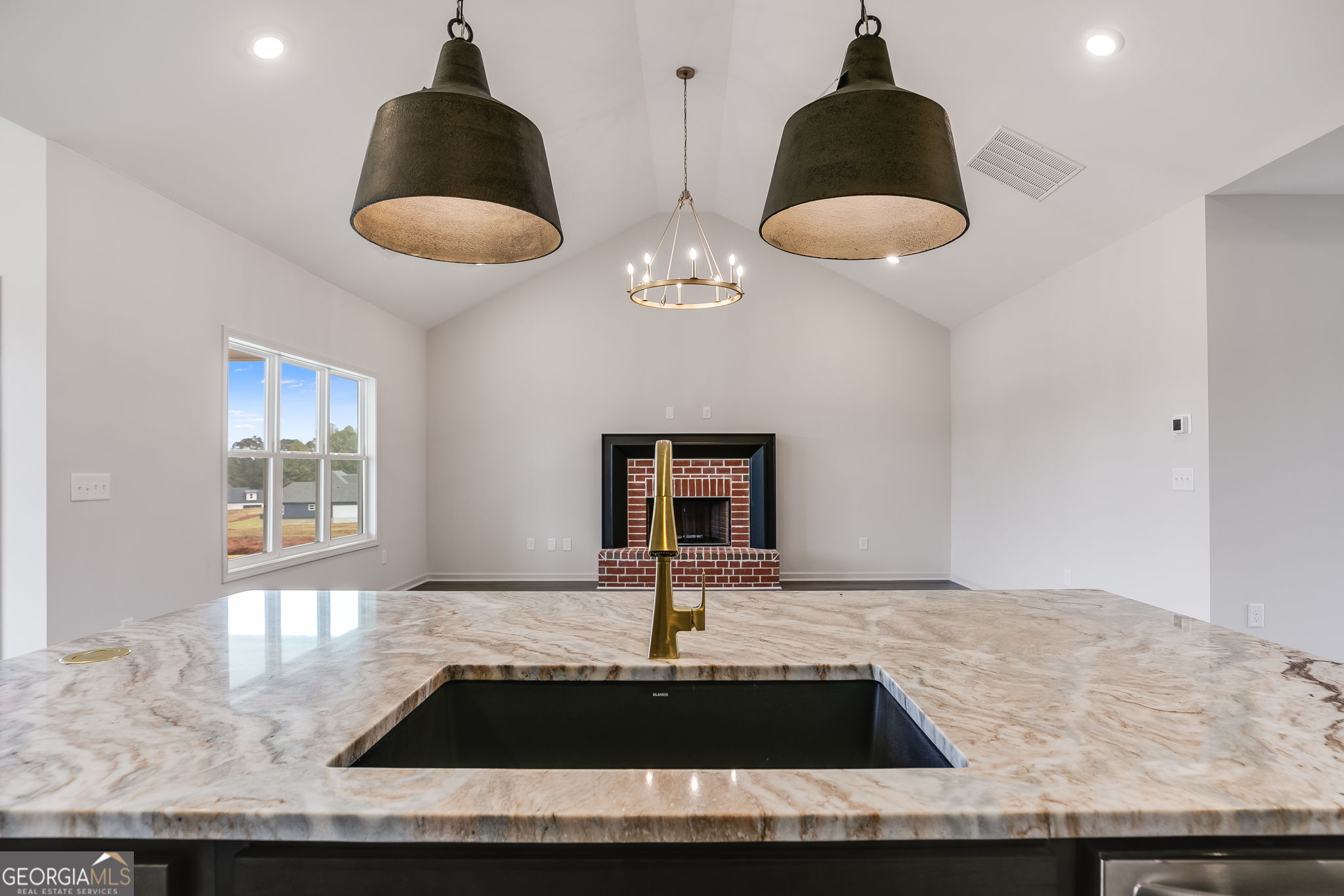 12 Stewart Road Roopville, GA 30170 - Photo 15 of 48 a view of a kitchen counter space and a chandelier