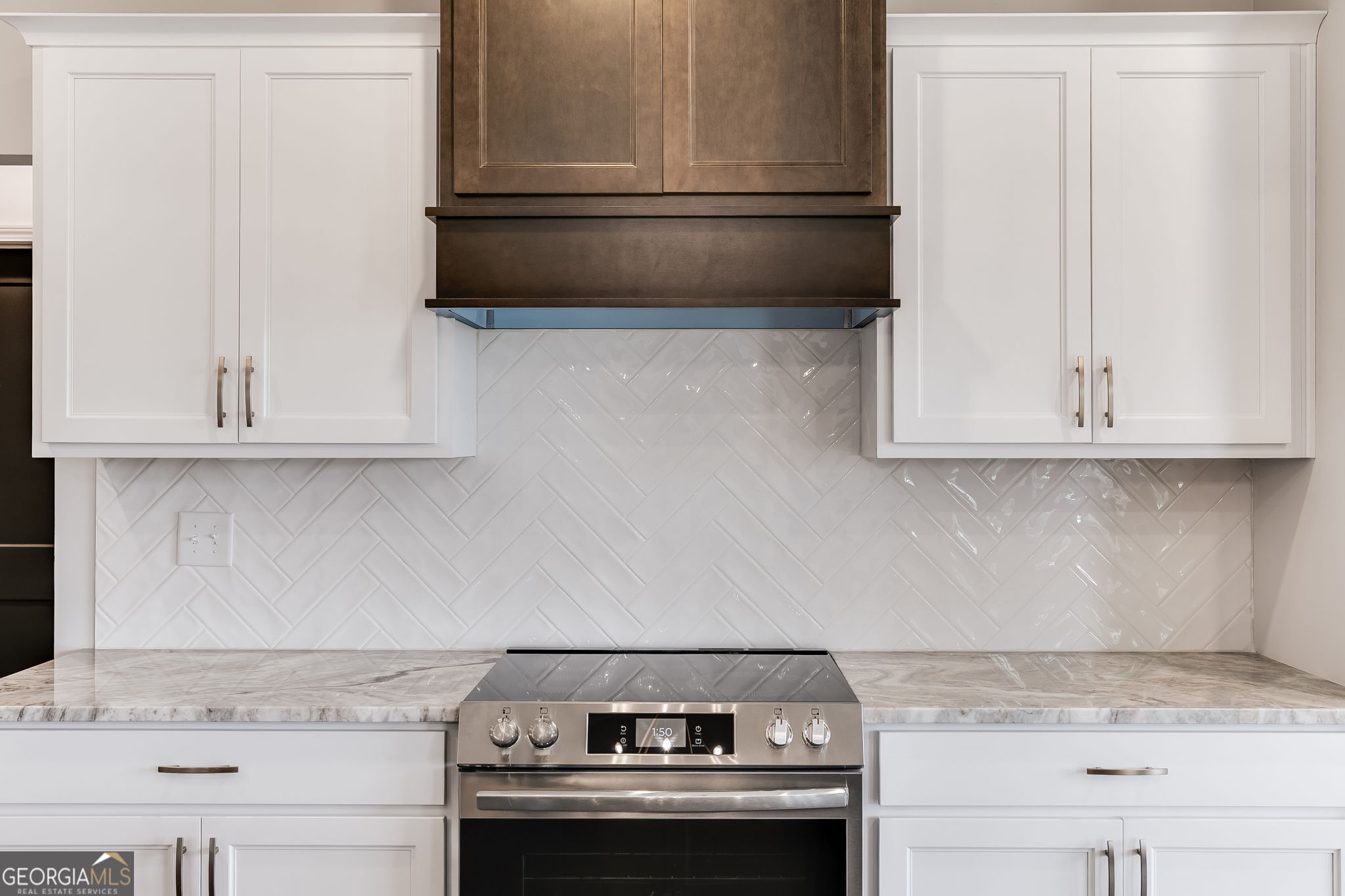 12 Stewart Road Roopville, GA 30170 - Photo 16 of 48 a stove top oven sitting inside of a kitchen