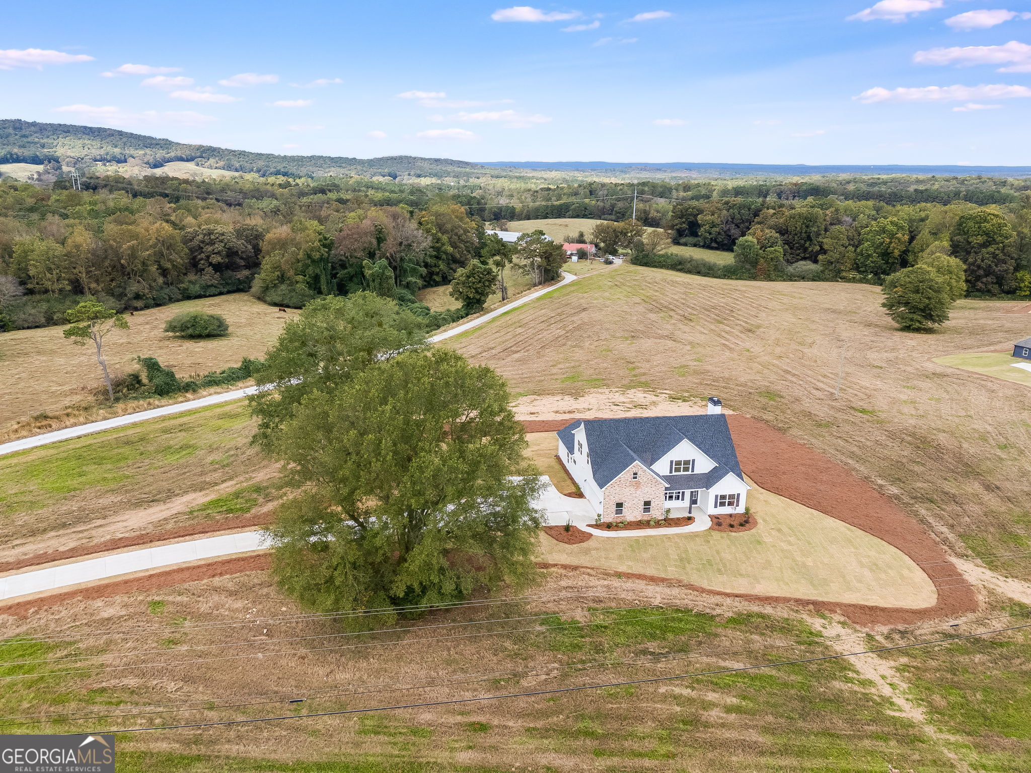 12 Stewart Road Roopville, GA 30170 - Photo 2 of 48 a view of a swimming pool with a yard