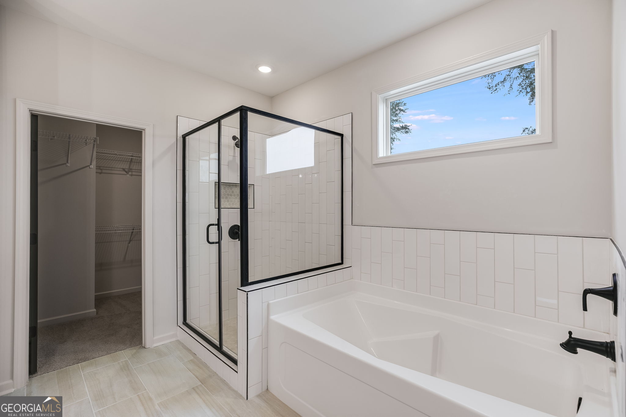 12 Stewart Road Roopville, GA 30170 - Photo 25 of 48 a bathroom with a bathtub and a shower