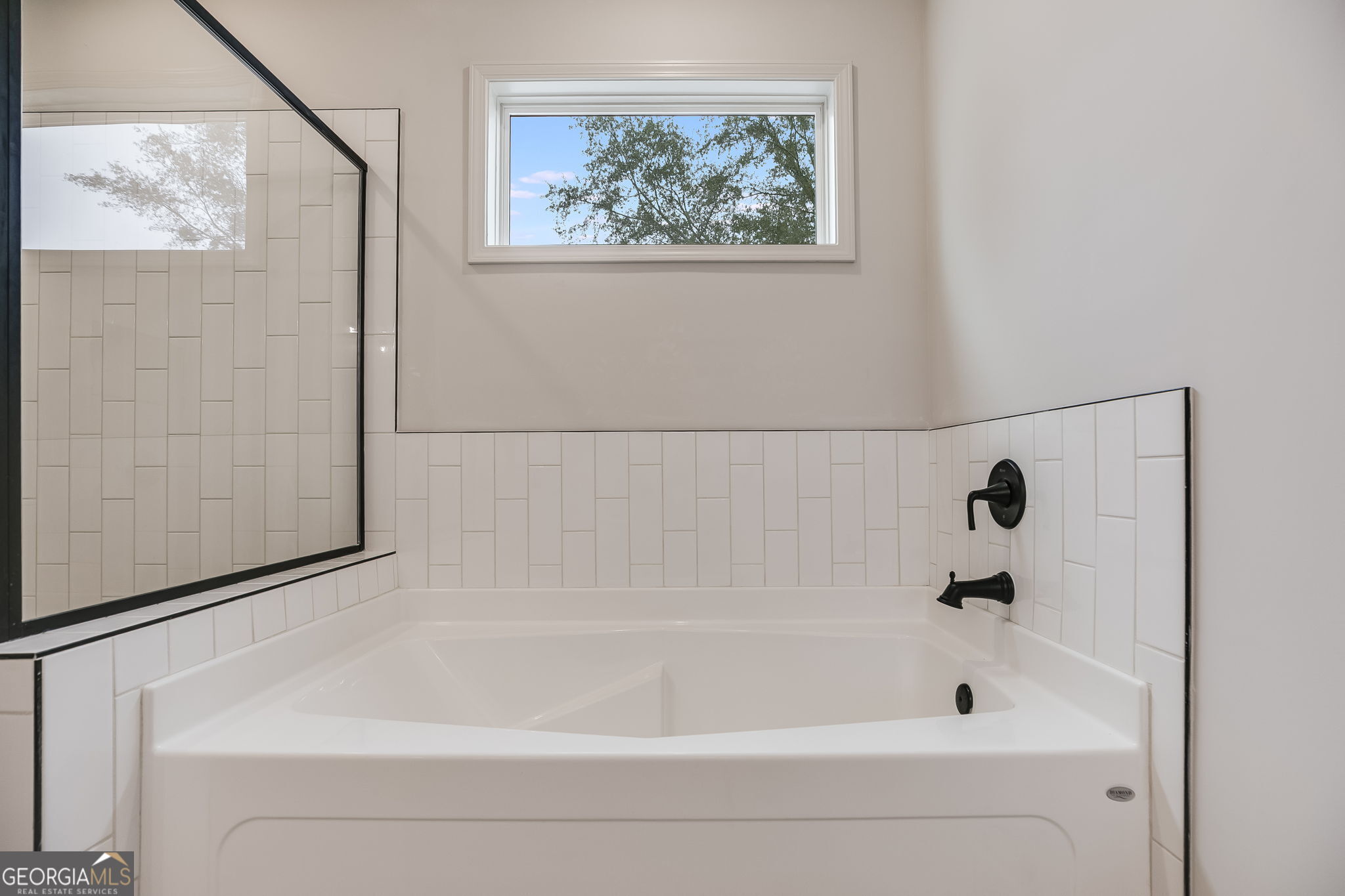 12 Stewart Road Roopville, GA 30170 - Photo 26 of 48 a bathroom with a bathtub