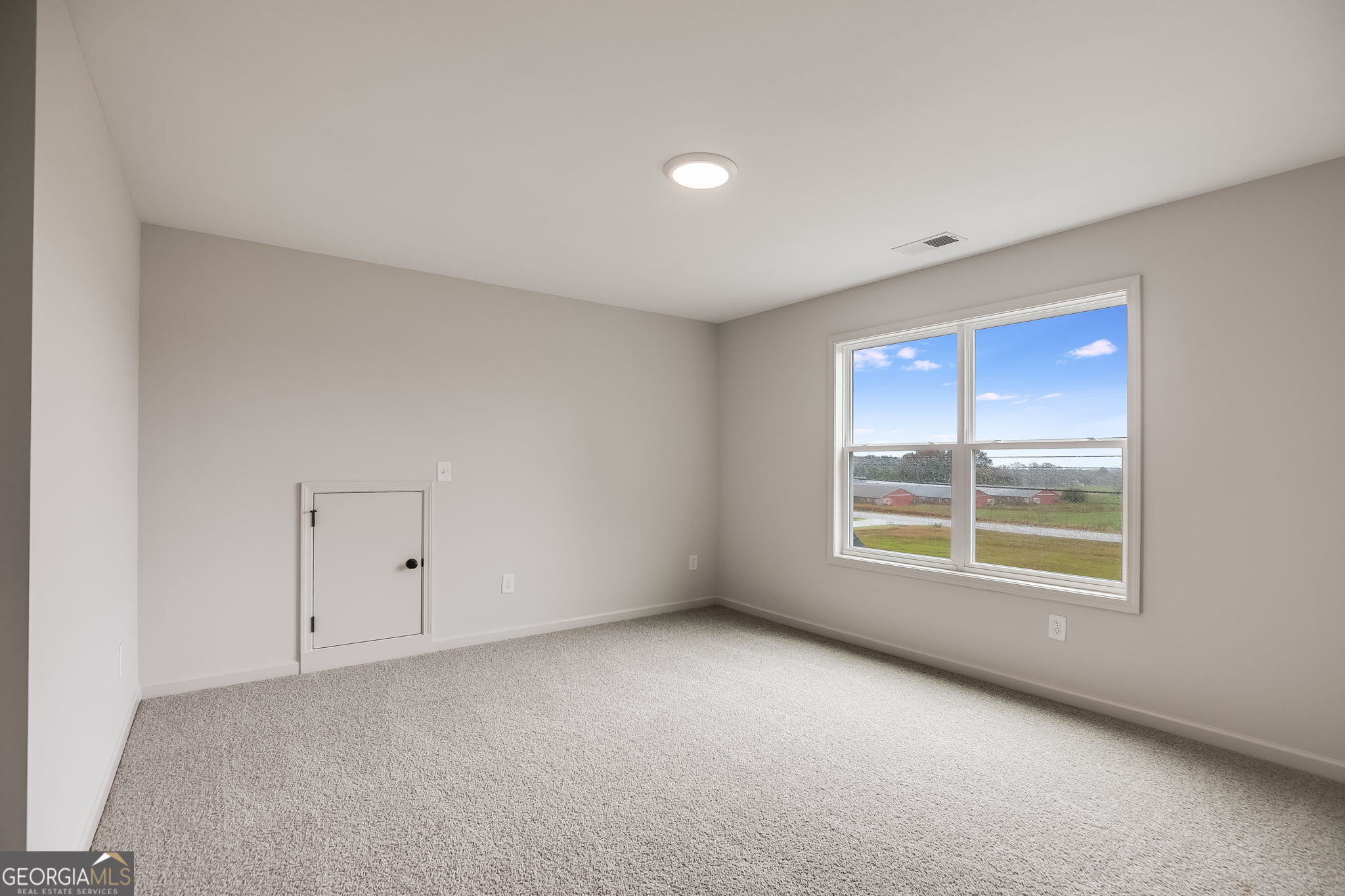 12 Stewart Road Roopville, GA 30170 - Photo 27 of 48 an empty room with a window