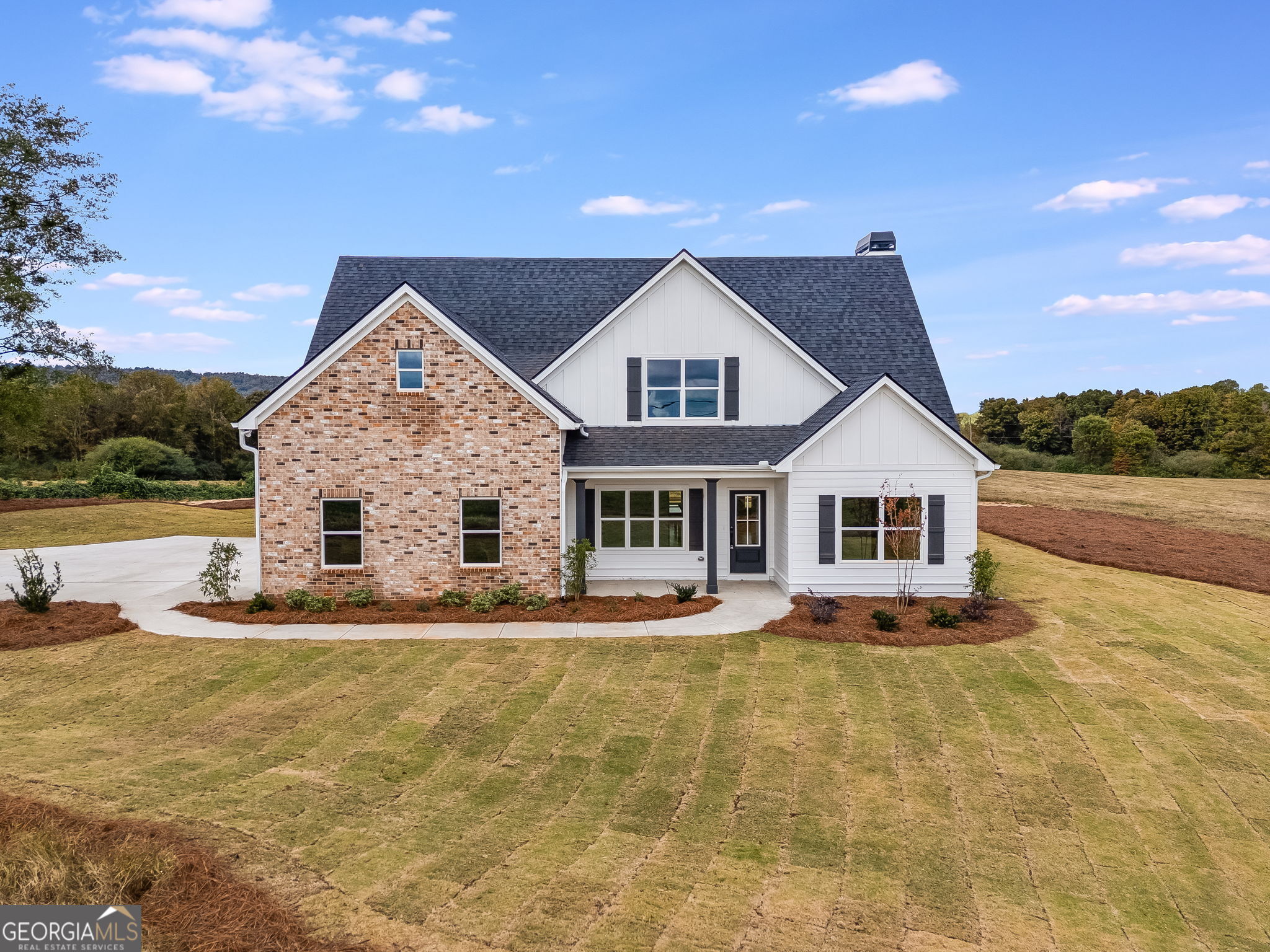 12 Stewart Road Roopville, GA 30170 - Photo 3 of 48 a front view of a house with a yard