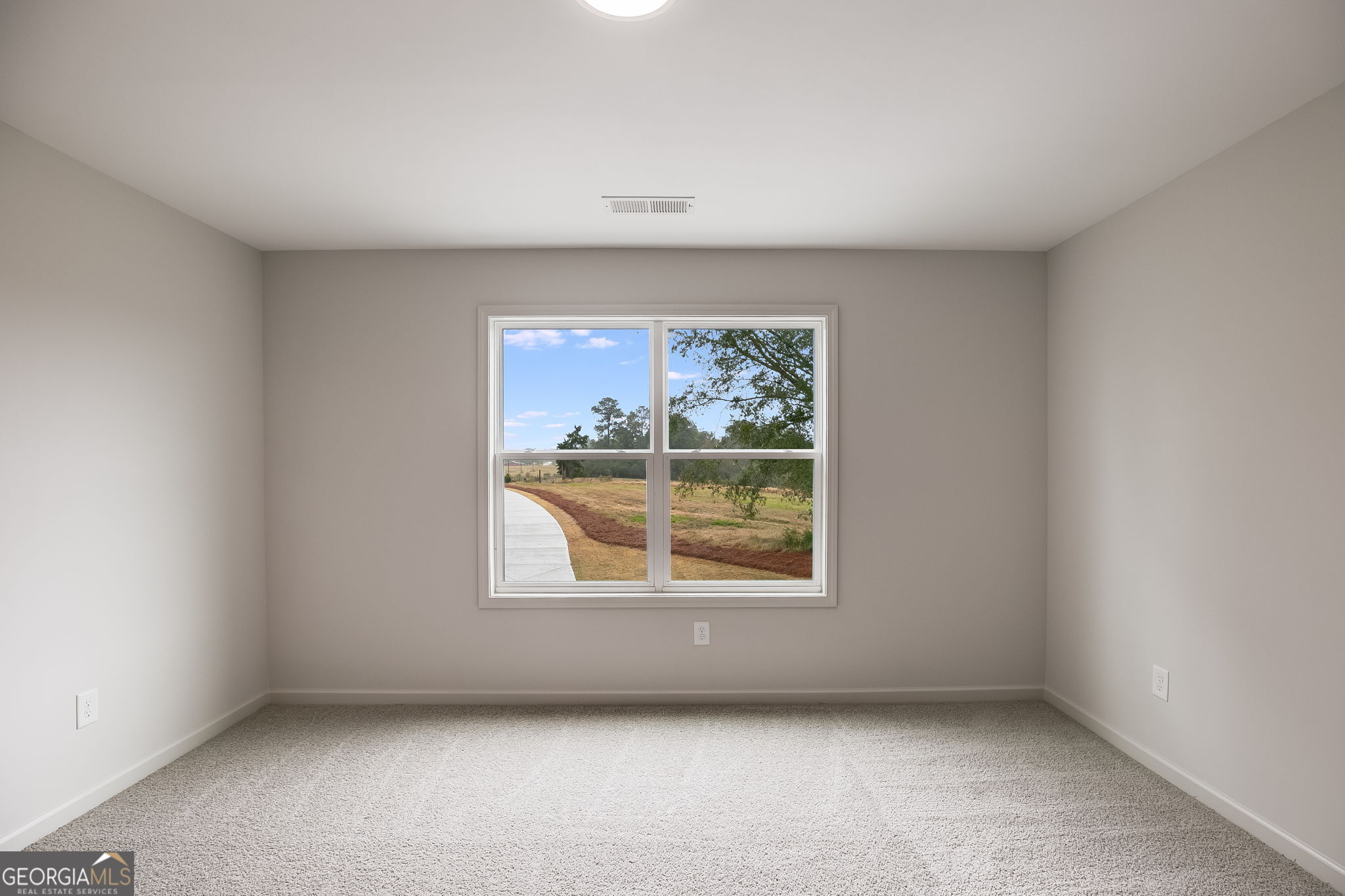 12 Stewart Road Roopville, GA 30170 - Photo 32 of 48 an empty room with a window