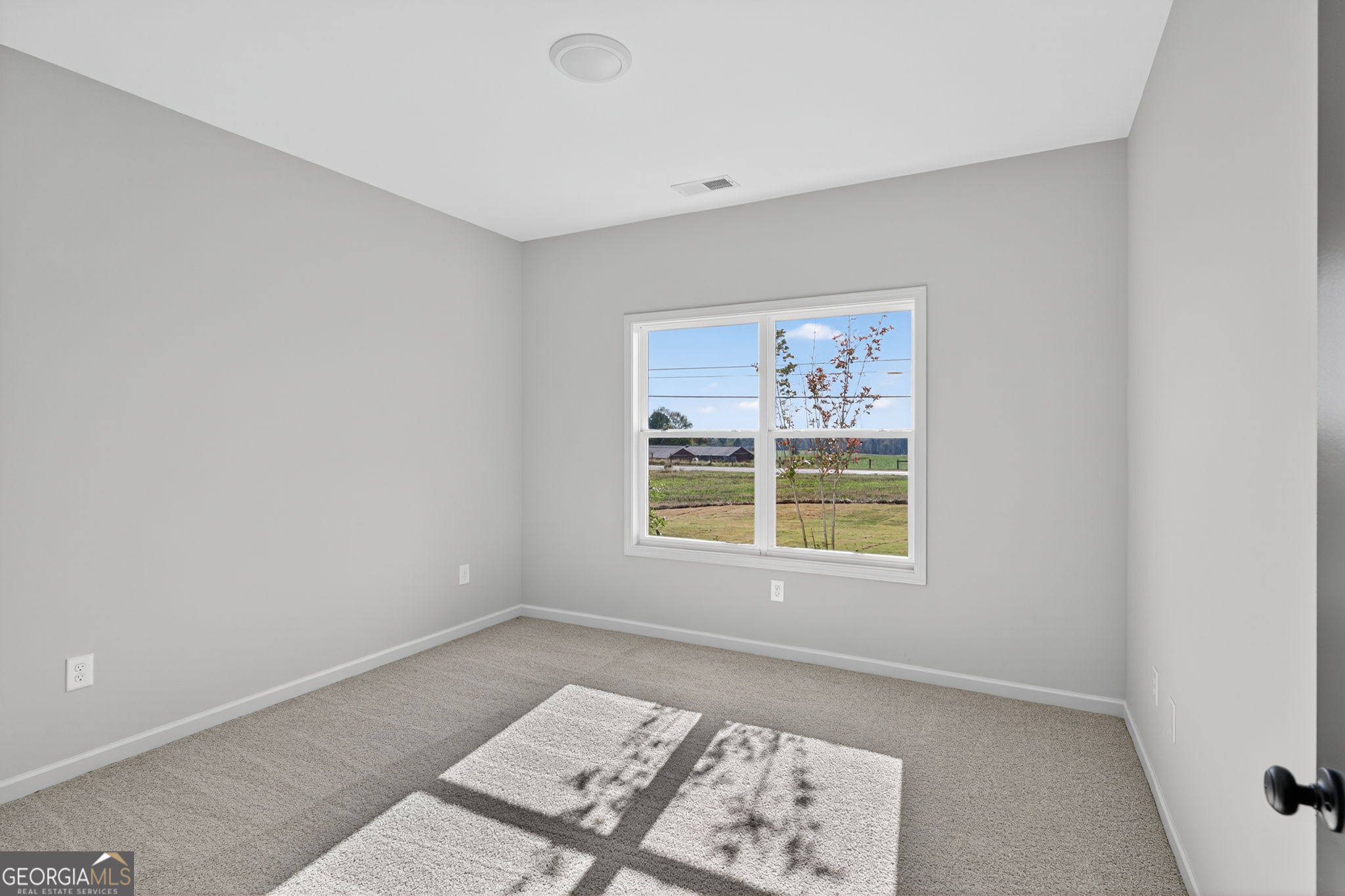 12 Stewart Road Roopville, GA 30170 - Photo 35 of 48 an empty room with a window