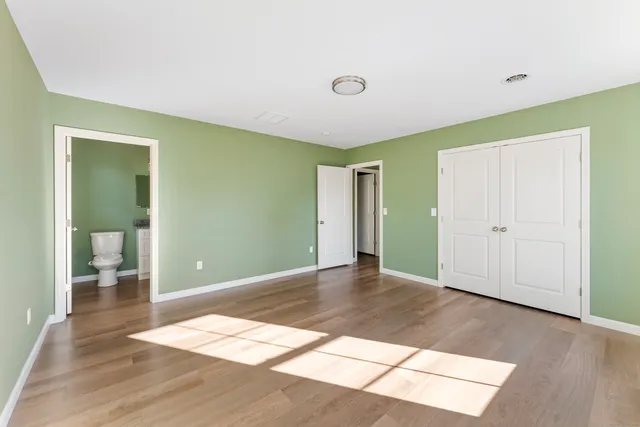 a view of livingroom with wooden floor