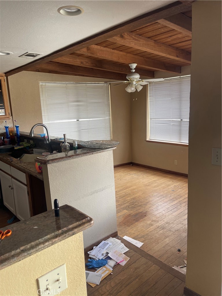 23859 Papago Road Apple Valley, CA 92307 - Photo 6 of 32 a kitchen with a sink and a stove