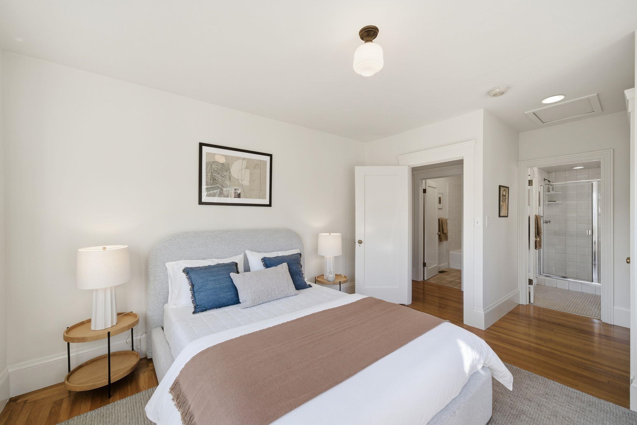 2401 Carleton Street Berkeley, CA 94704 - Photo 27 of 46 Bedroom featuring ensuite bath and wood finished floors
