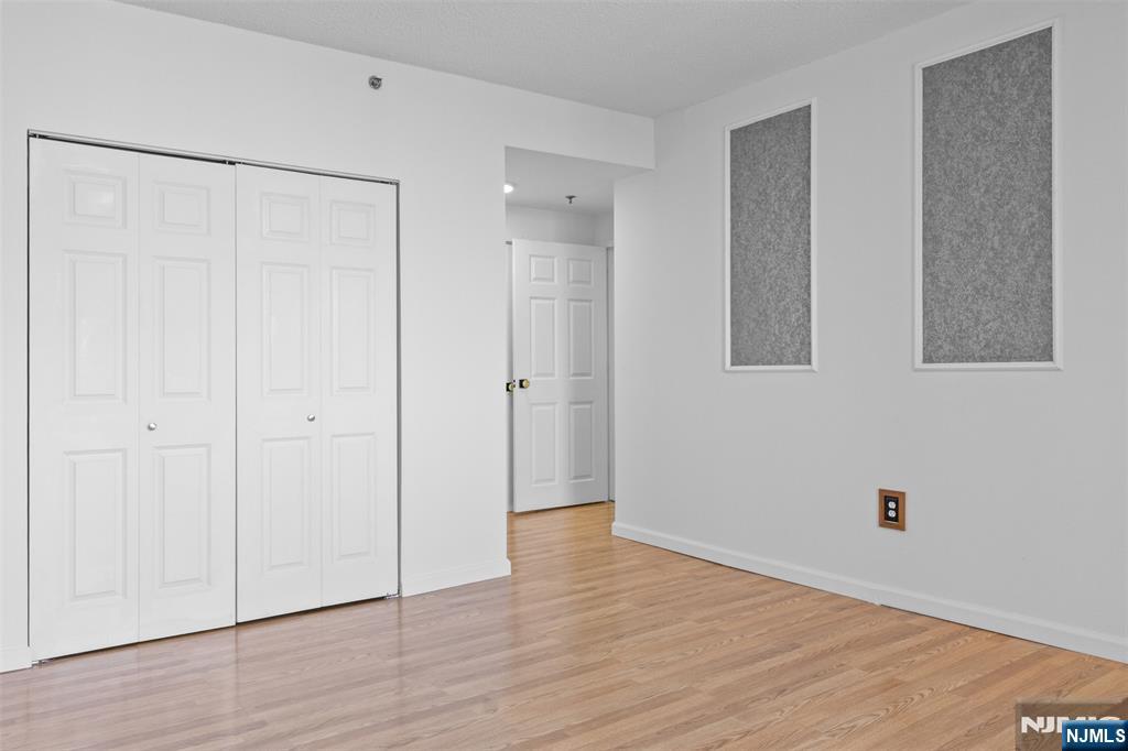 100 Old Palisade Road, Unit 3215 Fort Lee, NJ 07024 - Photo 25 of 43 a view of an empty room