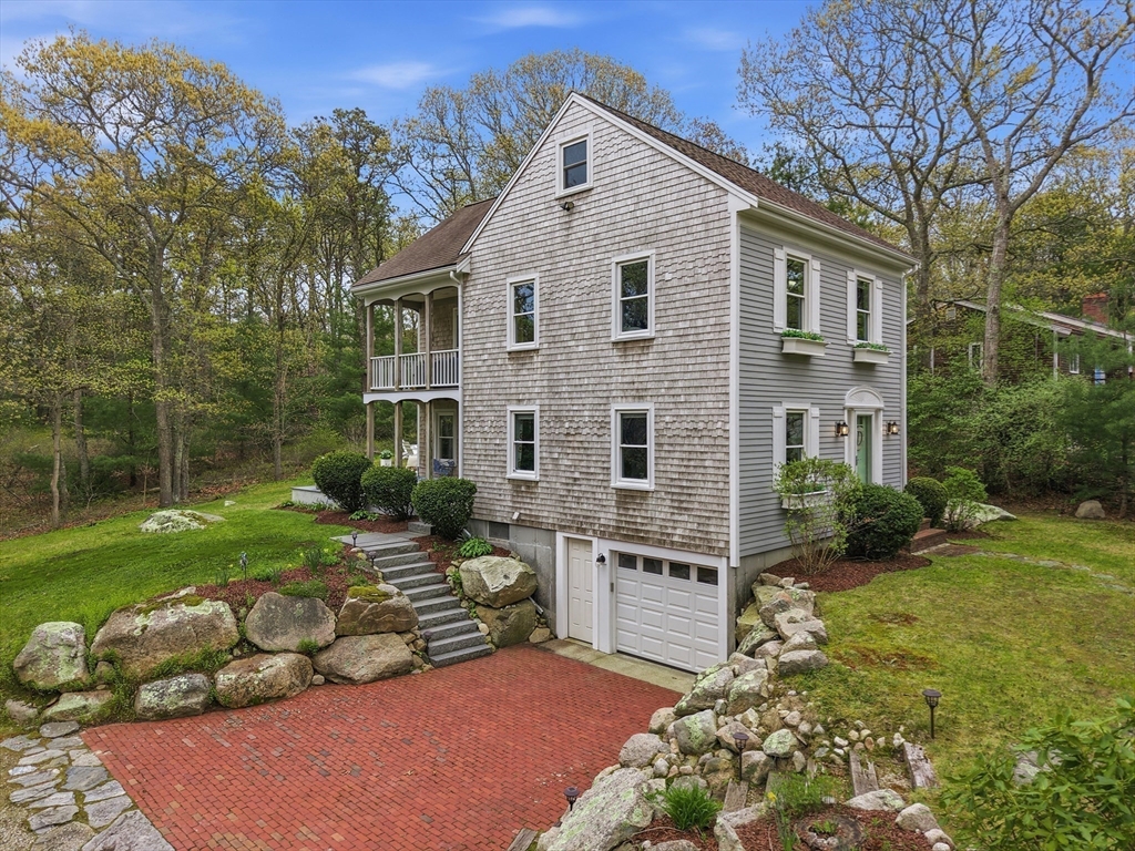 55 Ridgeview Drive Falmouth, MA 02540 - Photo 4 of 32 a front view of a house with garden