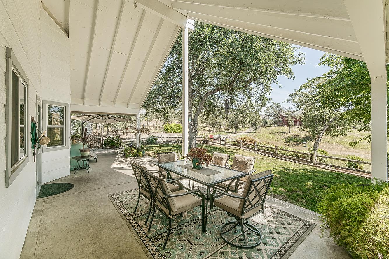 14815 Garlock Lane Prather, CA 93651 - Photo 5 of 80 a dining room with furniture and a floor to ceiling window