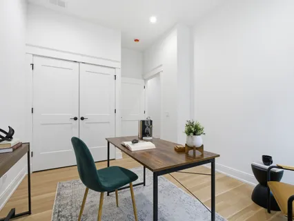 a view of a workspace with furniture