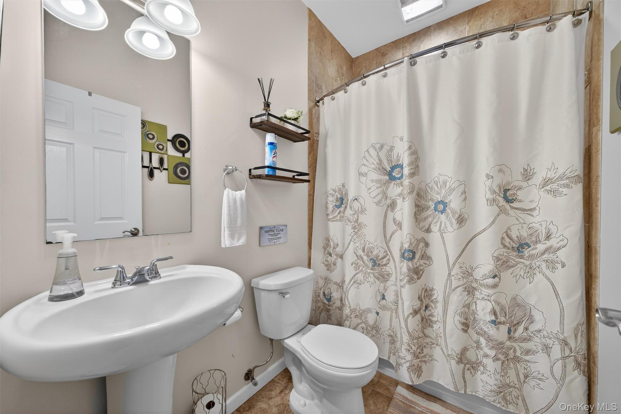 2 Primrose Lane Chester, NY 10918 - Photo 22 of 42 a bathroom with a sink toilet and shower