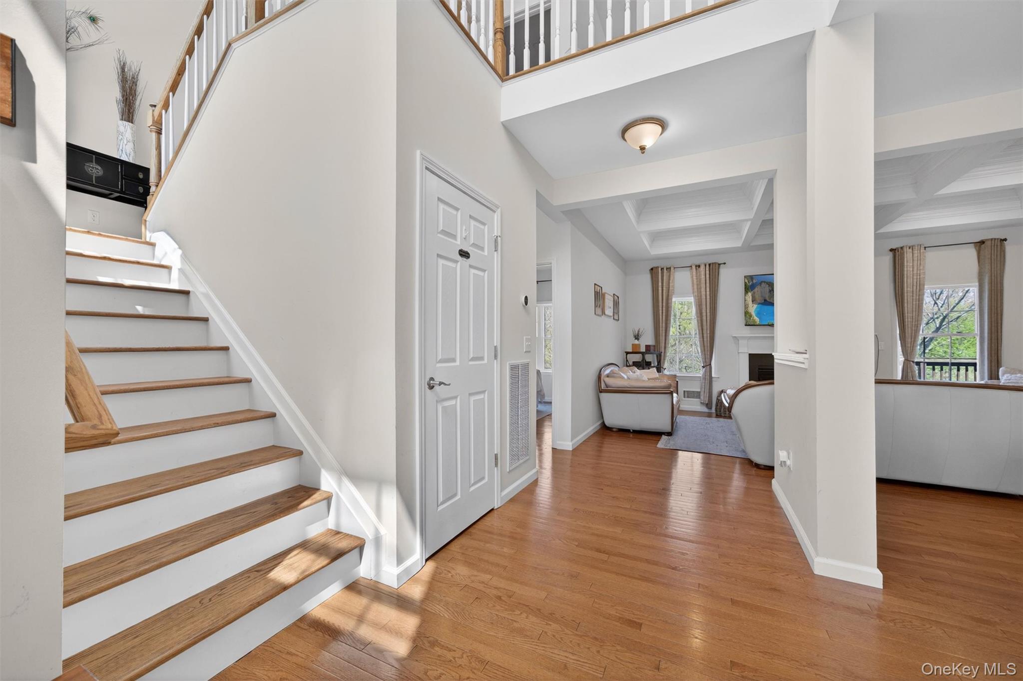 2 Primrose Lane Chester, NY 10918 - Photo 24 of 42 a view of a livingroom with wooden floor and stairs