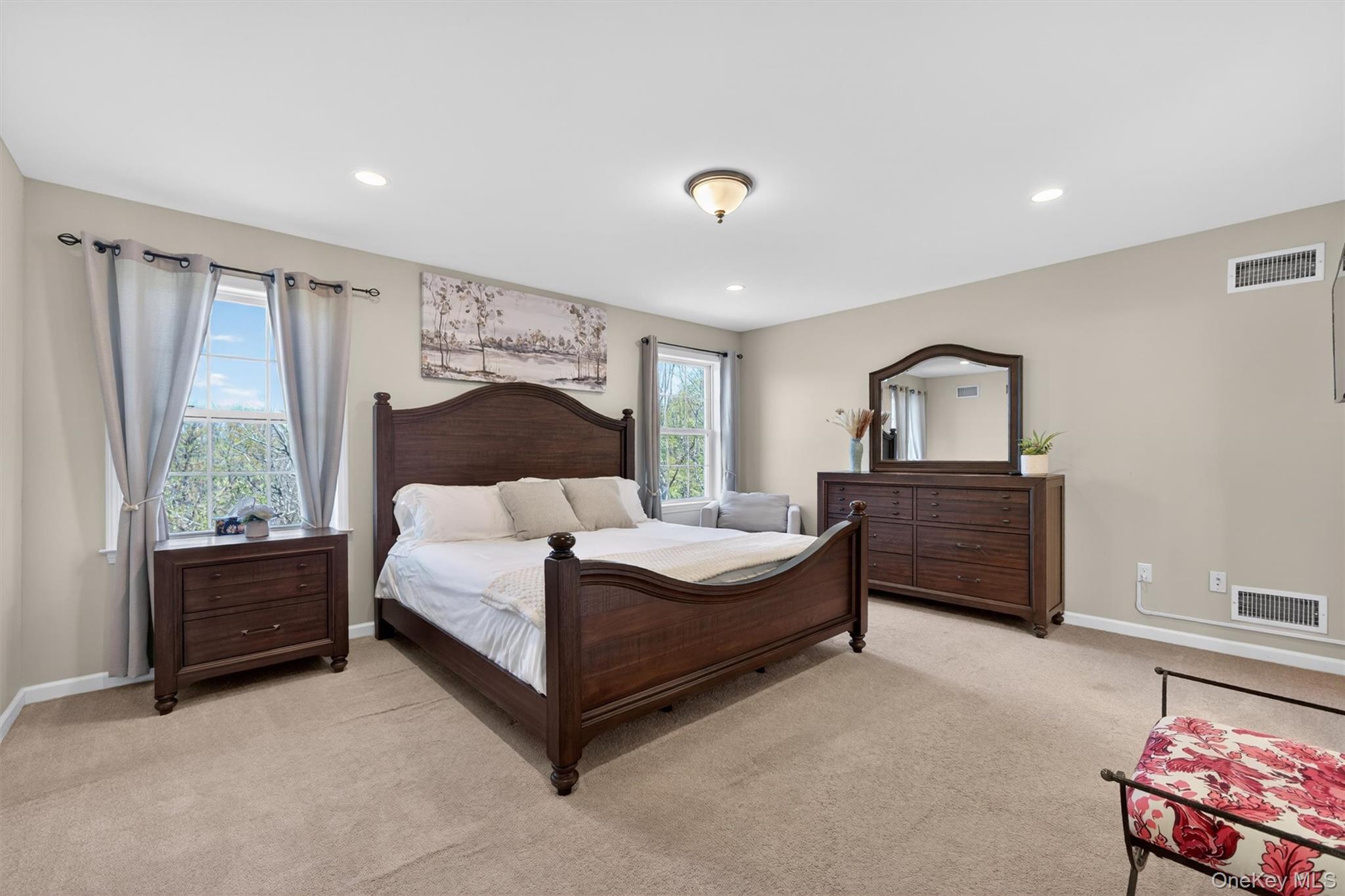 2 Primrose Lane Chester, NY 10918 - Photo 26 of 42 a spacious bedroom with a bed and a window