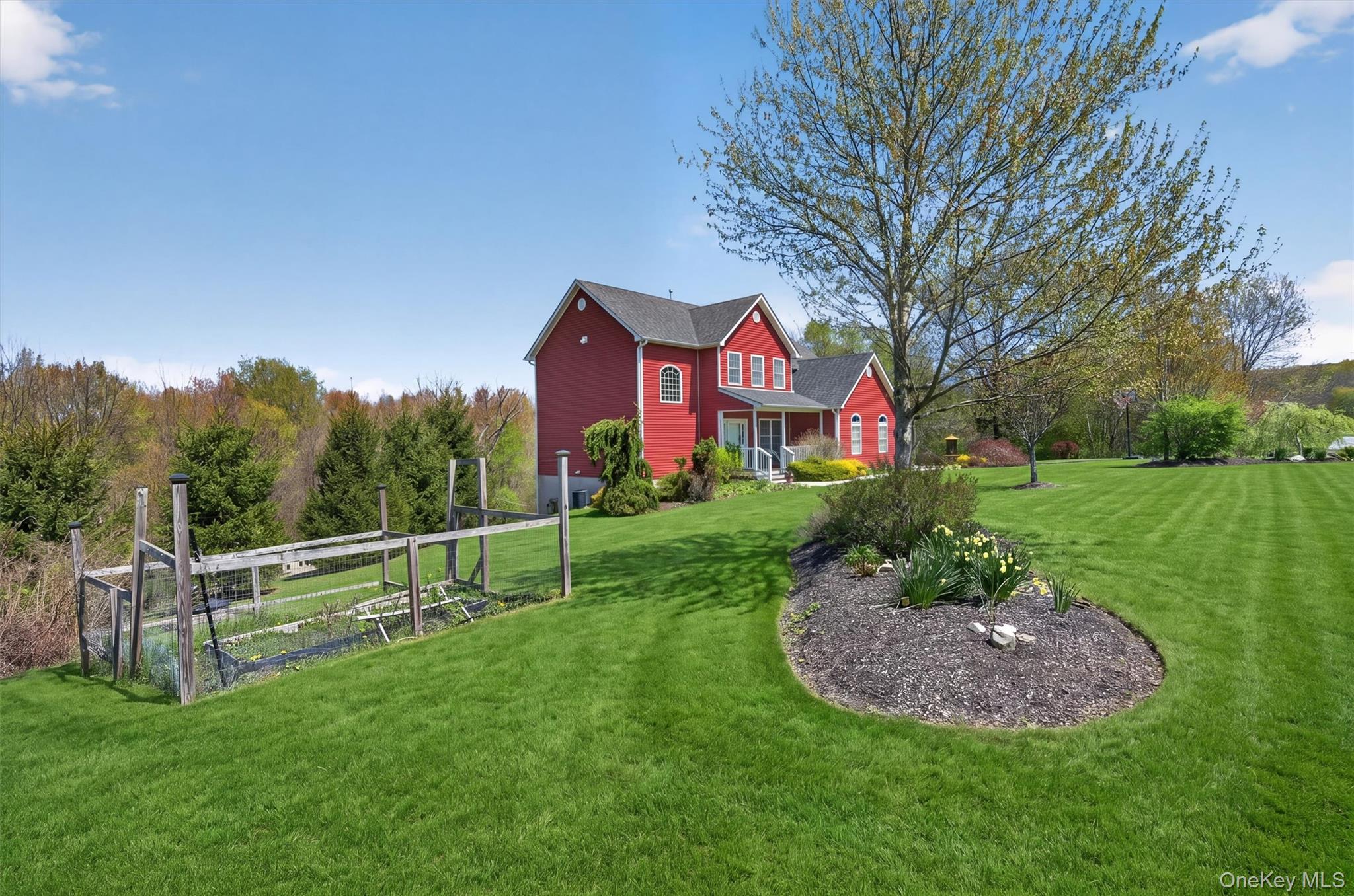 2 Primrose Lane Chester, NY 10918 - Photo 5 of 42 a view of a house with a big yard and potted plants