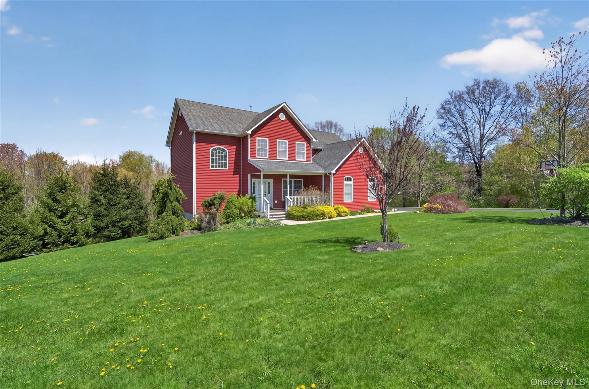 2 Primrose Lane Chester, NY 10918 - Photo 6 of 42 a front view of house with yard and green space
