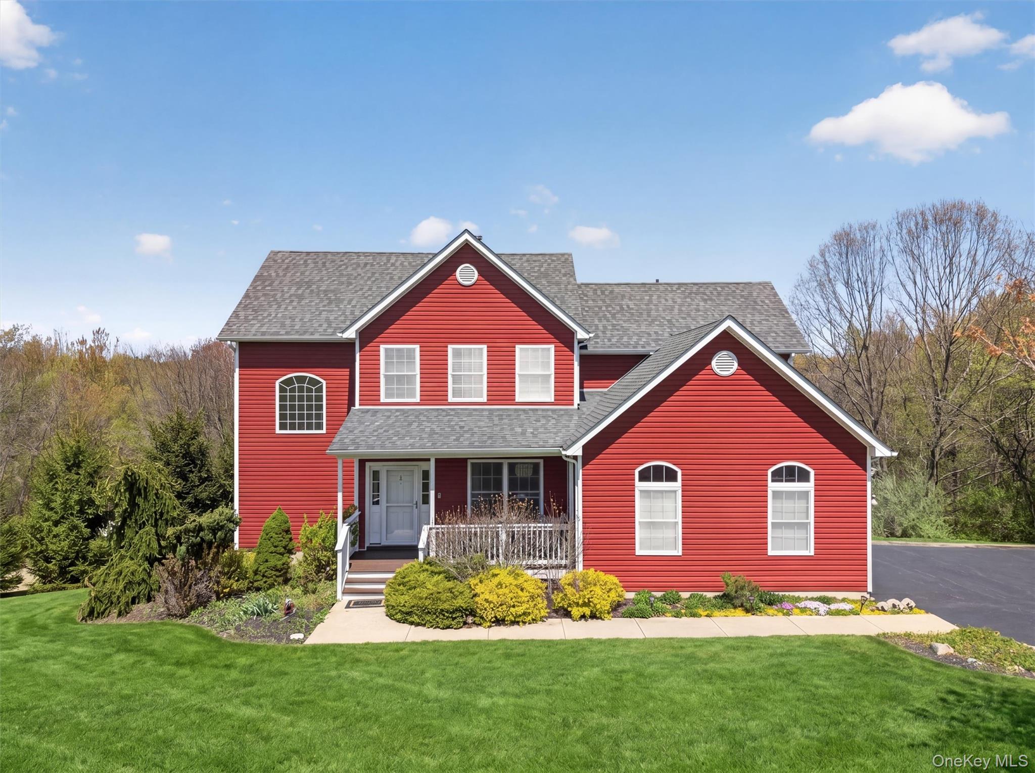 2 Primrose Lane Chester, NY 10918 - Photo 7 of 42 a front view of a house with a yard