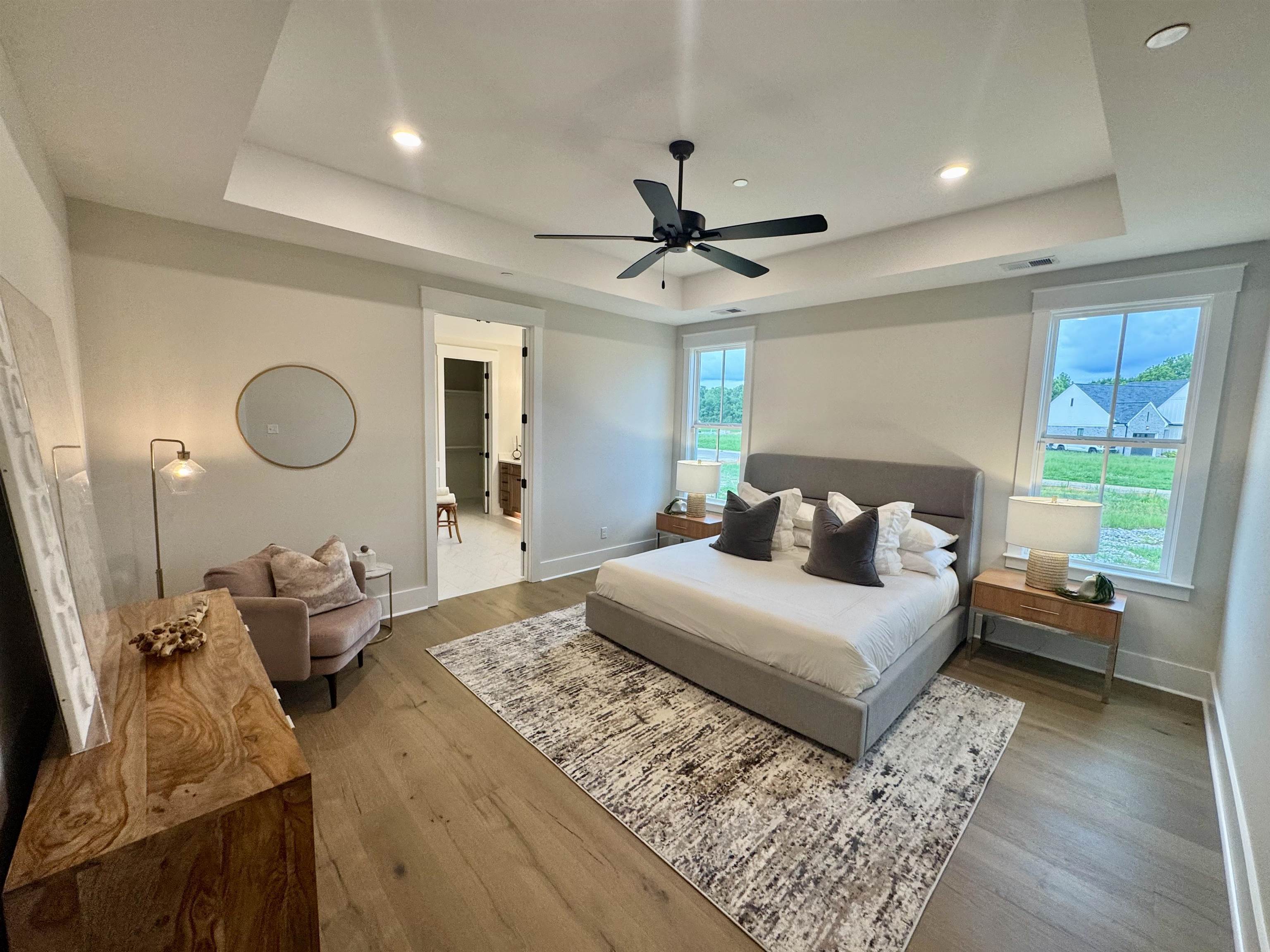 20 Rambling Rex Trail Piperton, TN 38017 - Photo 18 of 31 a bedroom with a bed and wooden floor