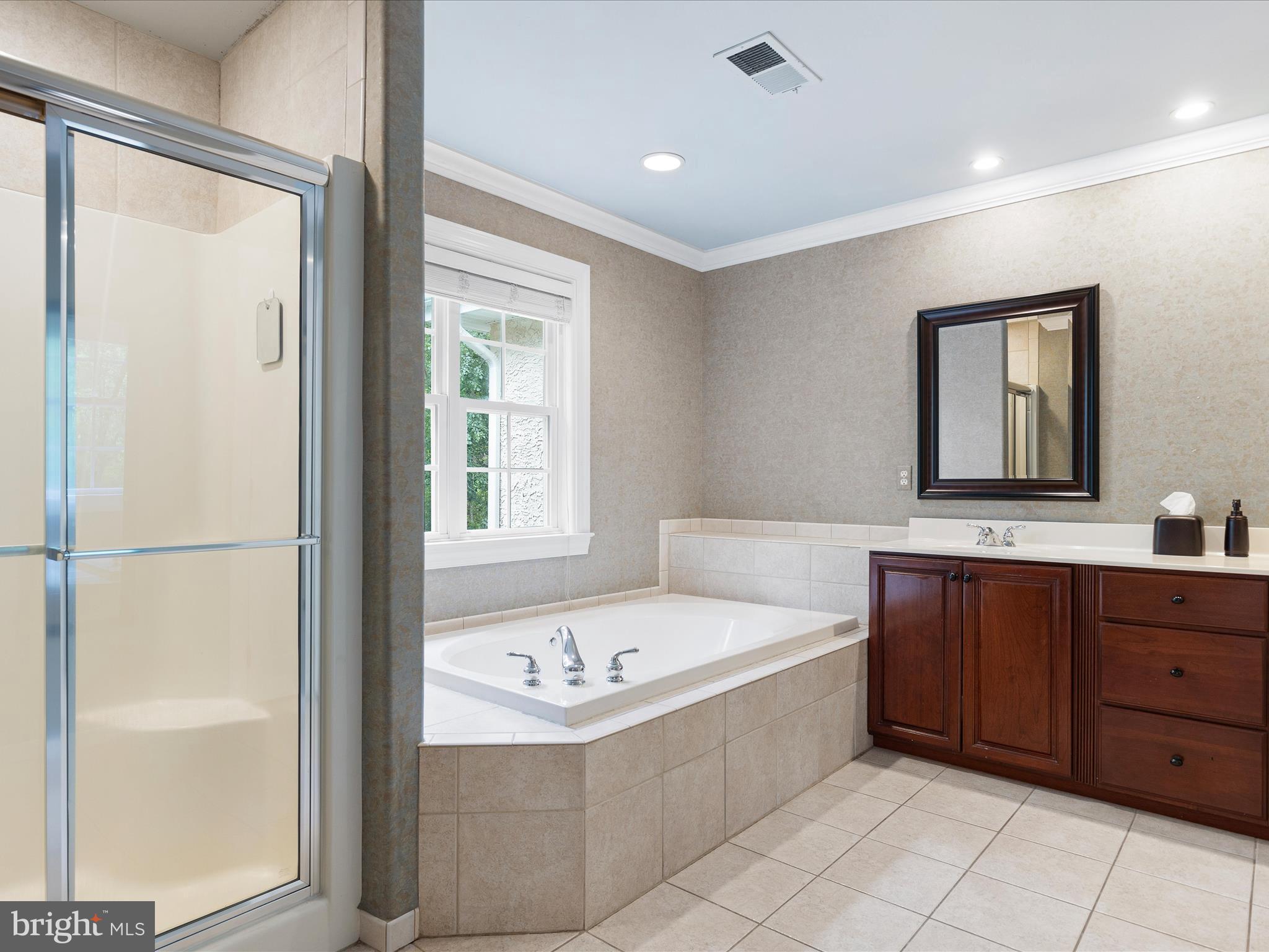130 Waterfall Lane Landenberg, PA 19350 - Photo 23 of 49 a bathroom with a bathtub and a sink