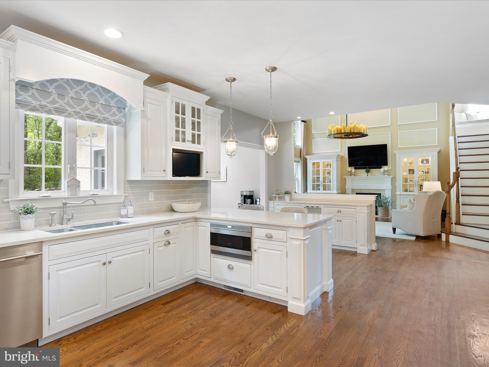 130 Waterfall Lane Landenberg, PA 19350 - Photo 8 of 49 a open kitchen with a sink and a stove top oven