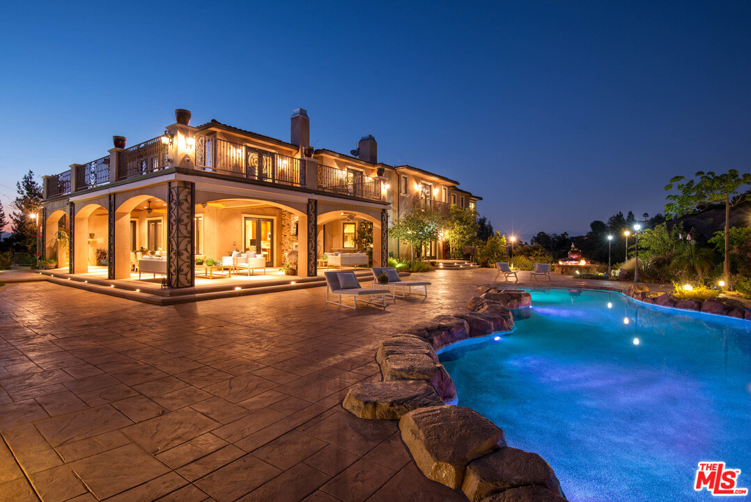 a view of a building with swimming pool