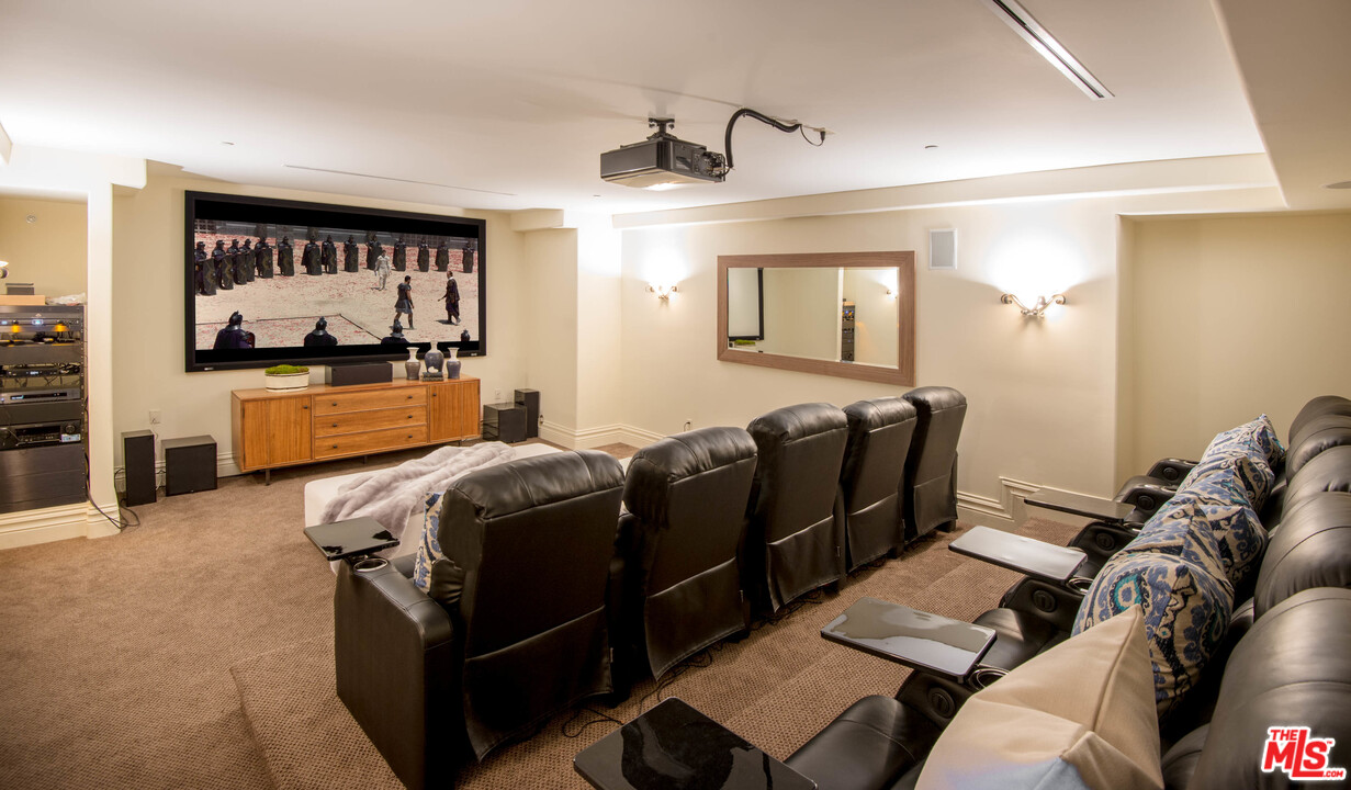 4775 Topeka Drive Tarzana, CA 91356 - Photo 14 of 19 a living room with furniture window and a flat screen tv