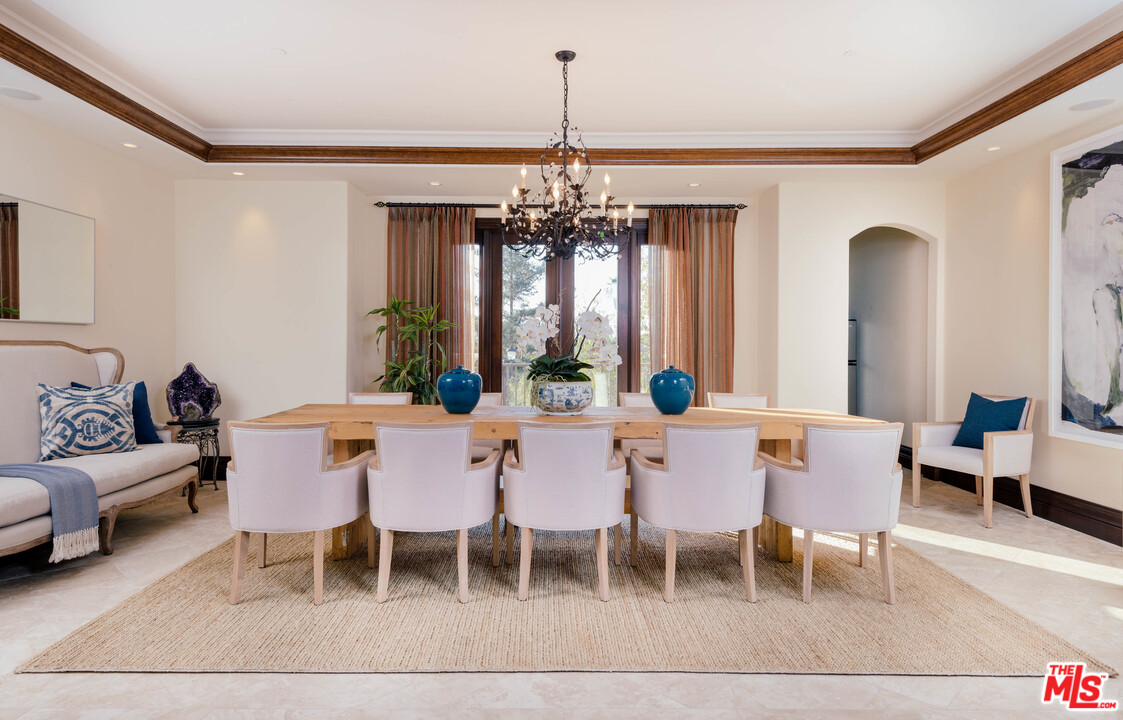 4775 Topeka Drive Tarzana, CA 91356 - Photo 10 of 19 a view of a dining room with furniture and window