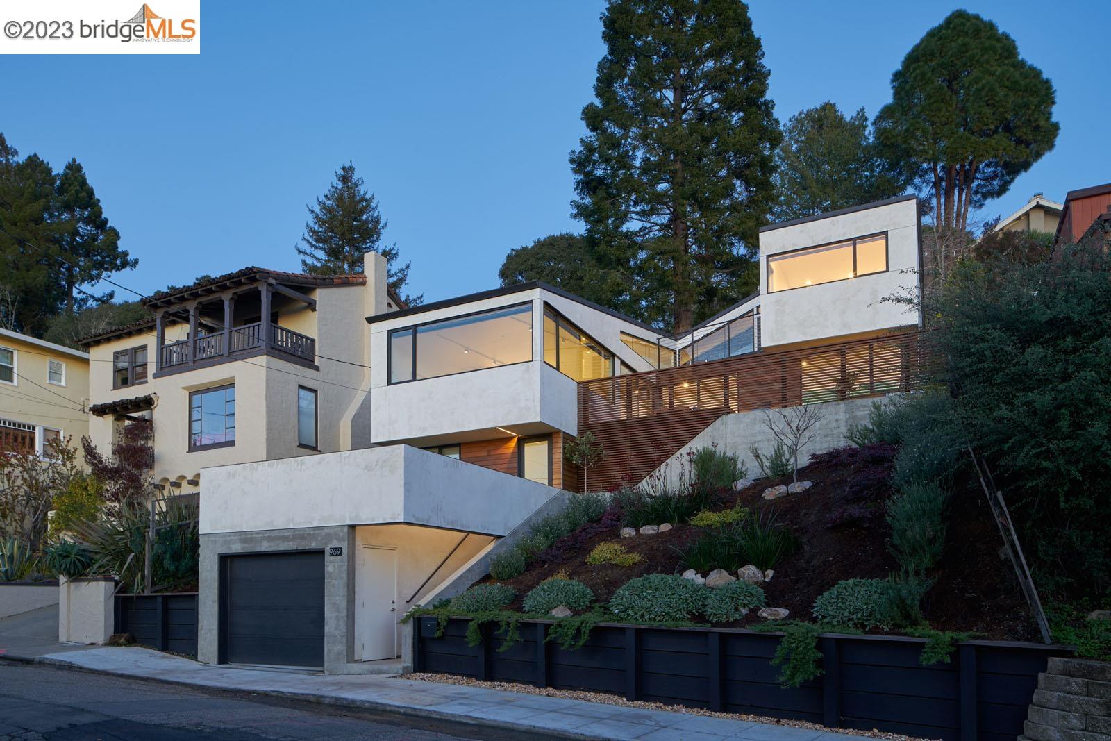 969 Cragmont Avenue Berkeley, CA 94708 - Photo 1 of 1 a front view of a house with a yard and potted plants